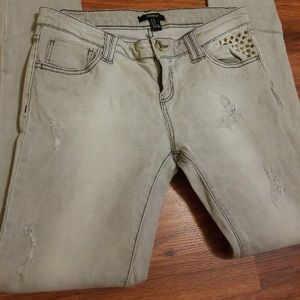 F21 grey studded skinny jeans